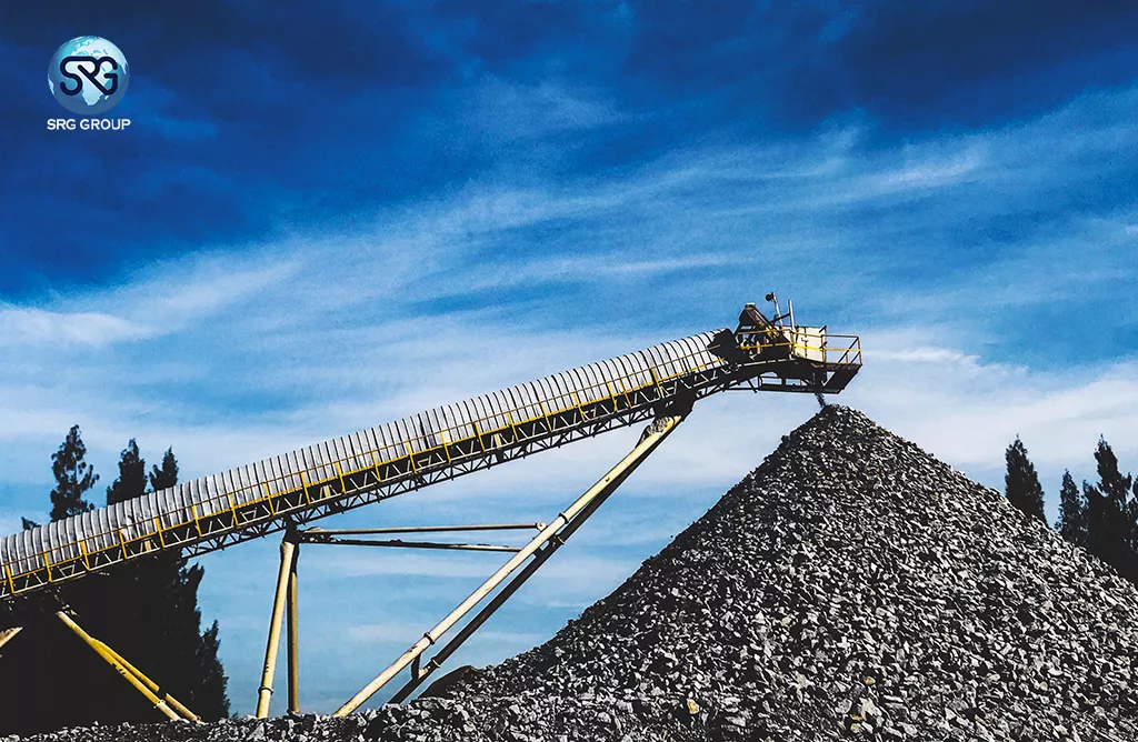 Heavy Dump Truck and Excavator in Active Iron Ore Mine Site